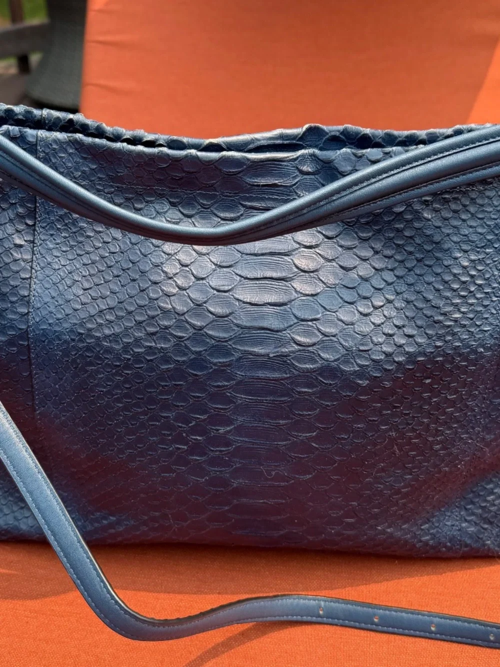 Coach bag in navy blue python-embossed leather with polished gold hardware